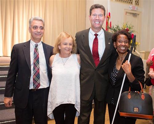 Dr. John Mascia, Joan Garrett, John Merrill and Barbara Manuel pose for a photo at ASB.  